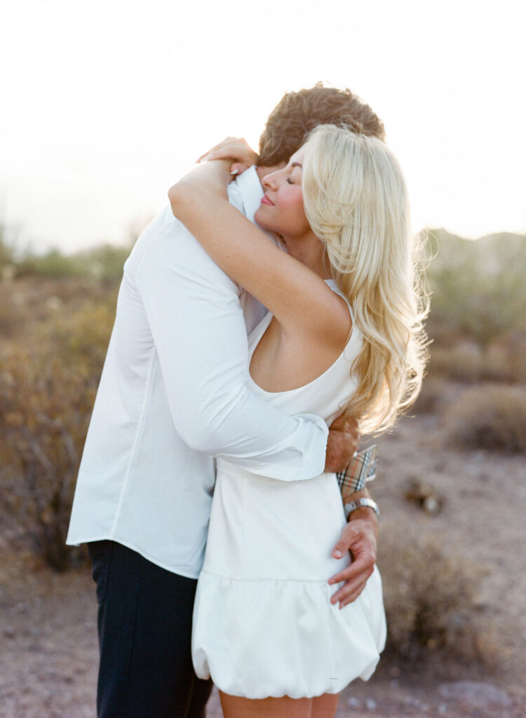 Romantic Arizona engagement photos desert embrace