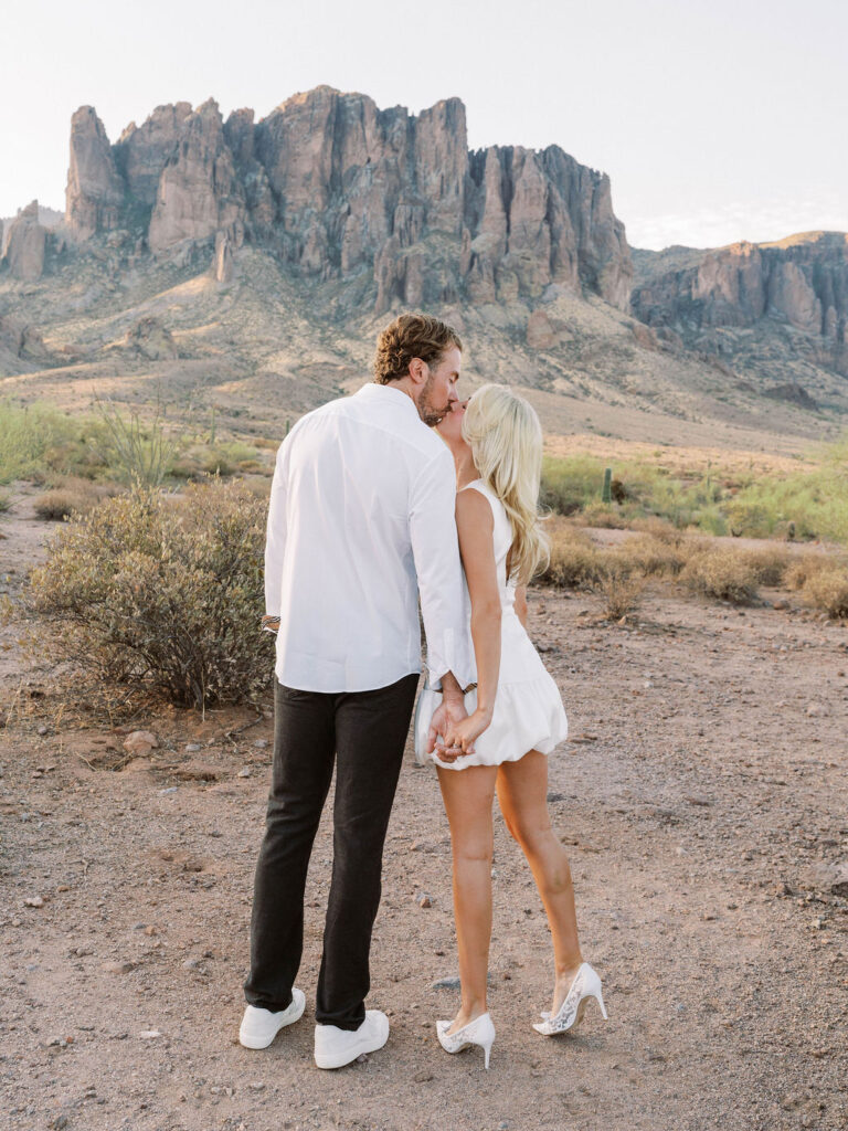 Romantic Arizona engagement photographer desert kiss