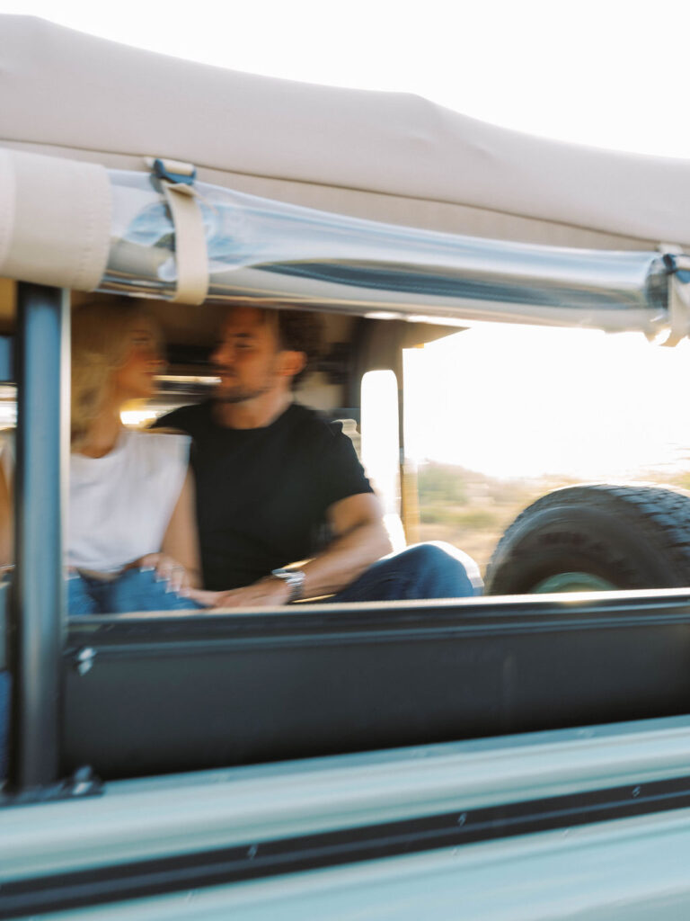 Candid Arizona engagement photography couple inside Land Rover