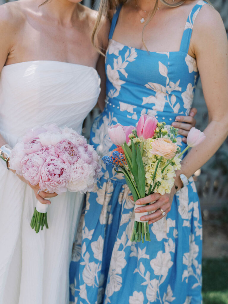 Bridesmaids holding colorful bouquets Arizona fine art wedding