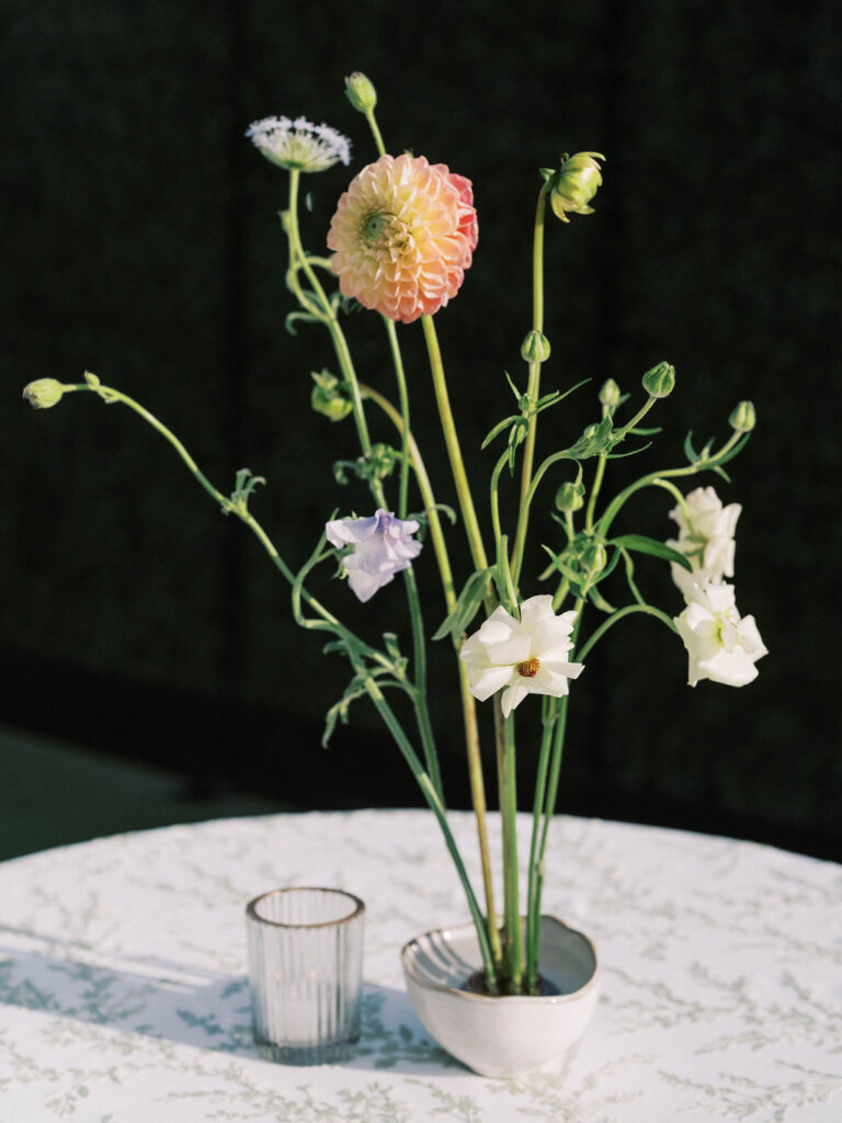 Tall modern floral centerpiece wedding reception table