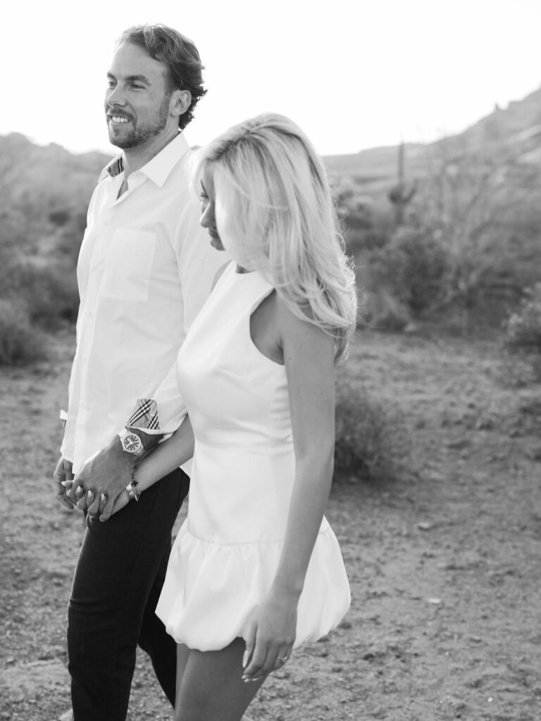 Arizona desert engagement photography candid walking photo