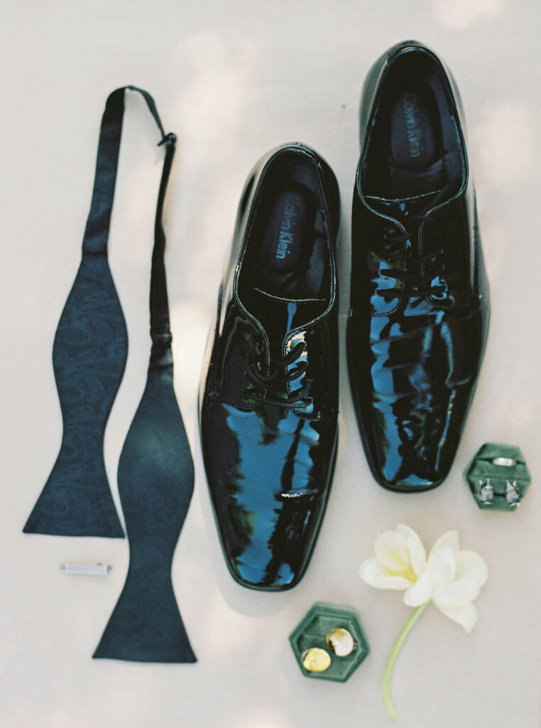 Groom wedding details styled flatlay at Camelback Inn