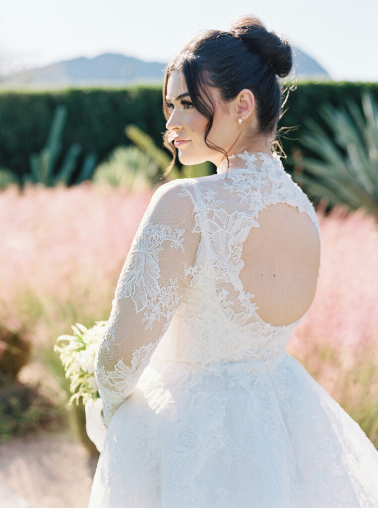 Bride’s lace gown with open back detail in Scottsdale.