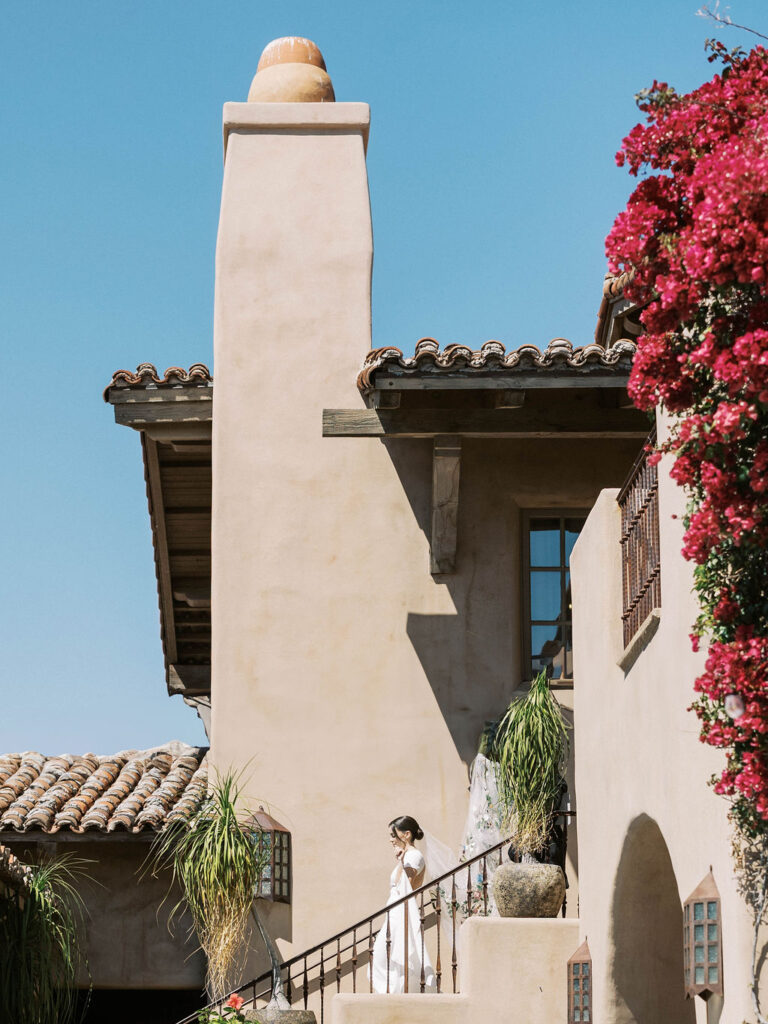 DC Ranch wedding venue exterior with bougainvillea