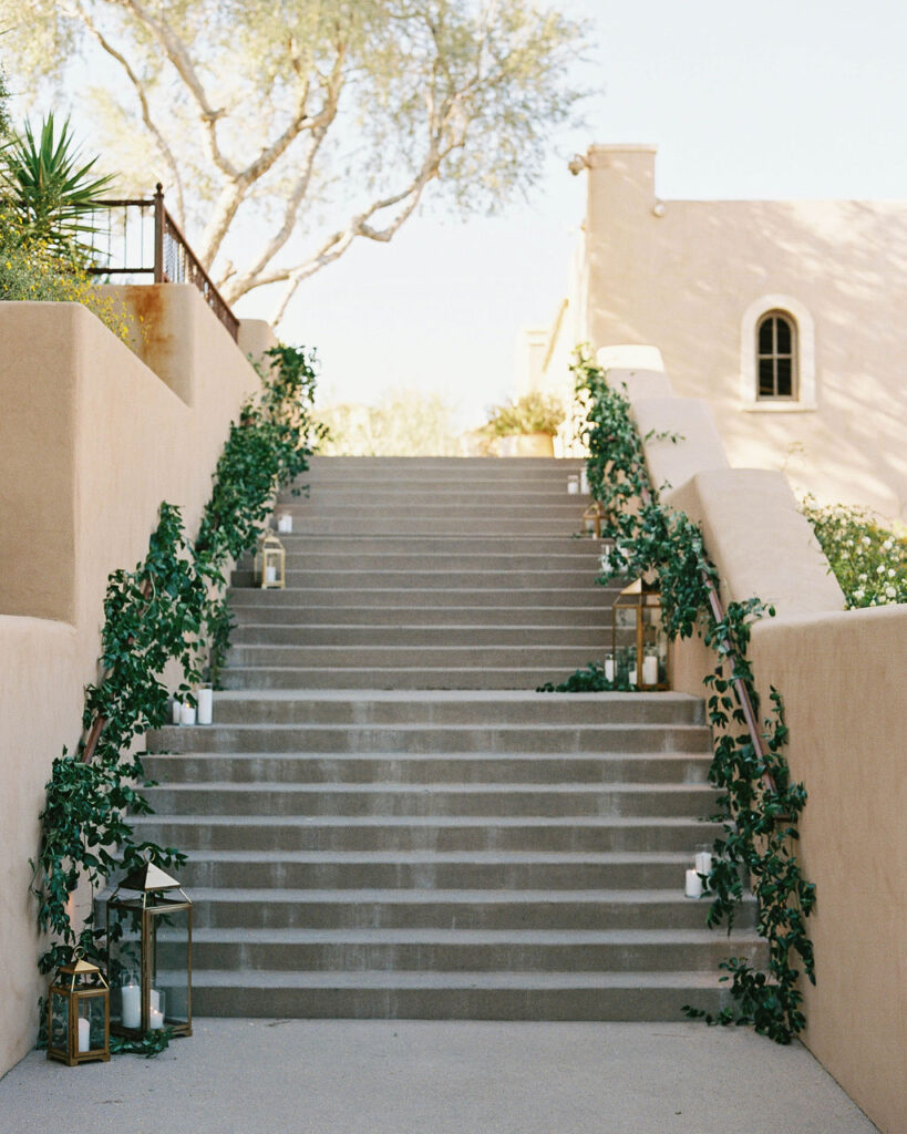 Floral-decorated staircase for DC Ranch wedding ceremony