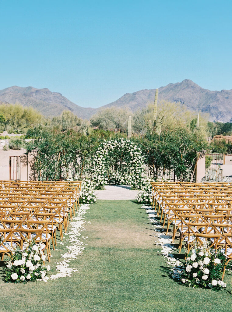 Outdoor ceremony setup with mountain views at DC Ranch