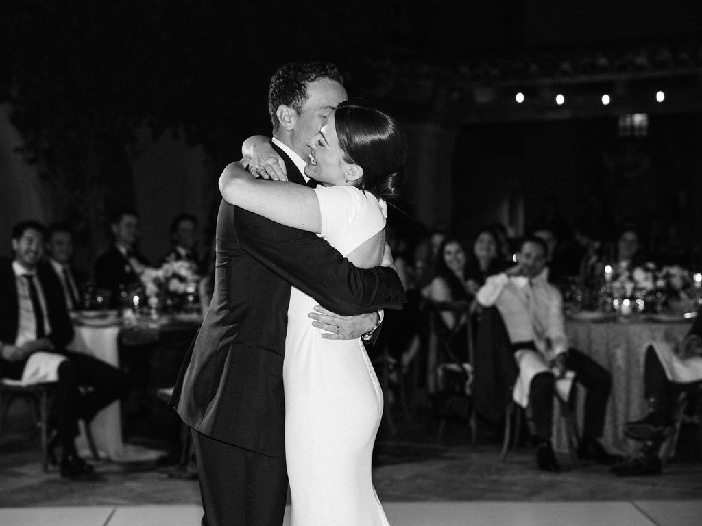 Bride and groom sharing emotional embrace at DC Ranch