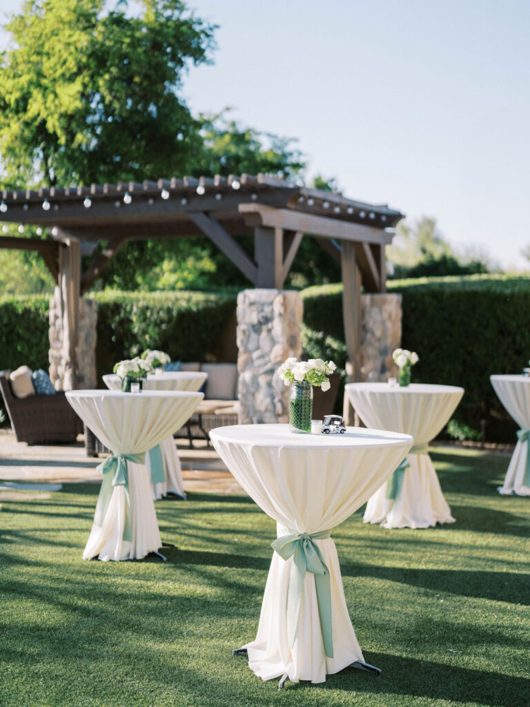 Outdoor cocktail tables at Silverleaf Masters Golf wedding welcome party Arizona