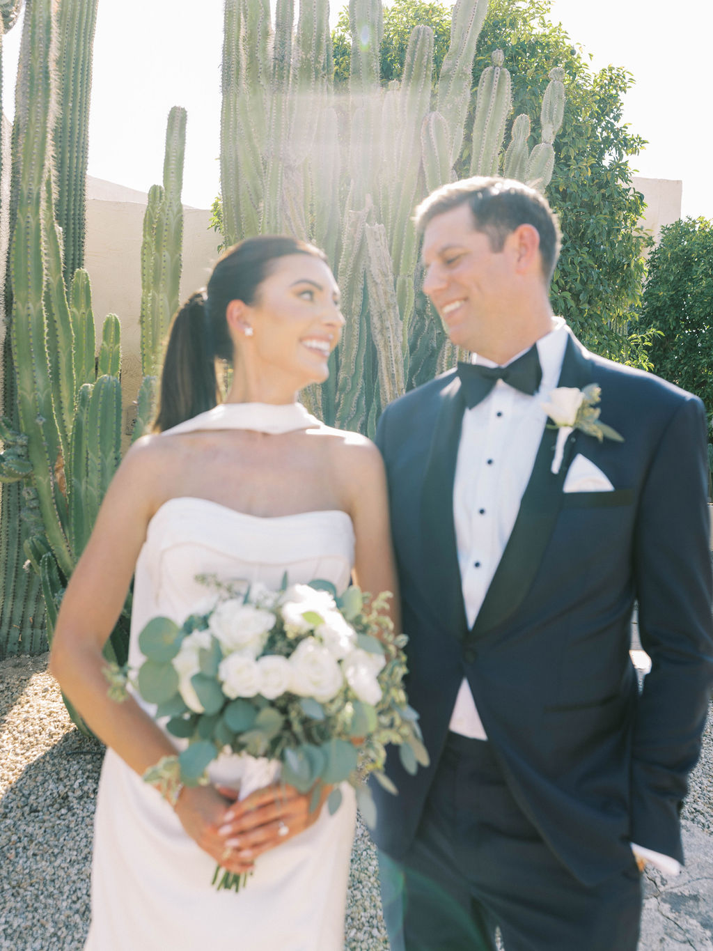 Bride and groom portrait in cactus garden at Camelback Inn