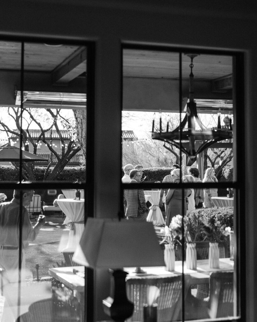 Black-and-white reflection of guests at Silverleaf Masters Golf wedding party