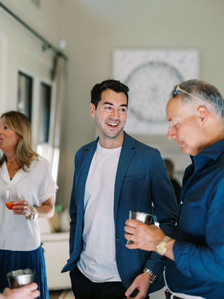 Guests in conversation at Silverleaf Arizona Masters Golf wedding welcome party