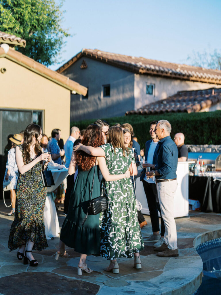 Guests in conversation at Silverleaf Masters Golf wedding welcome party