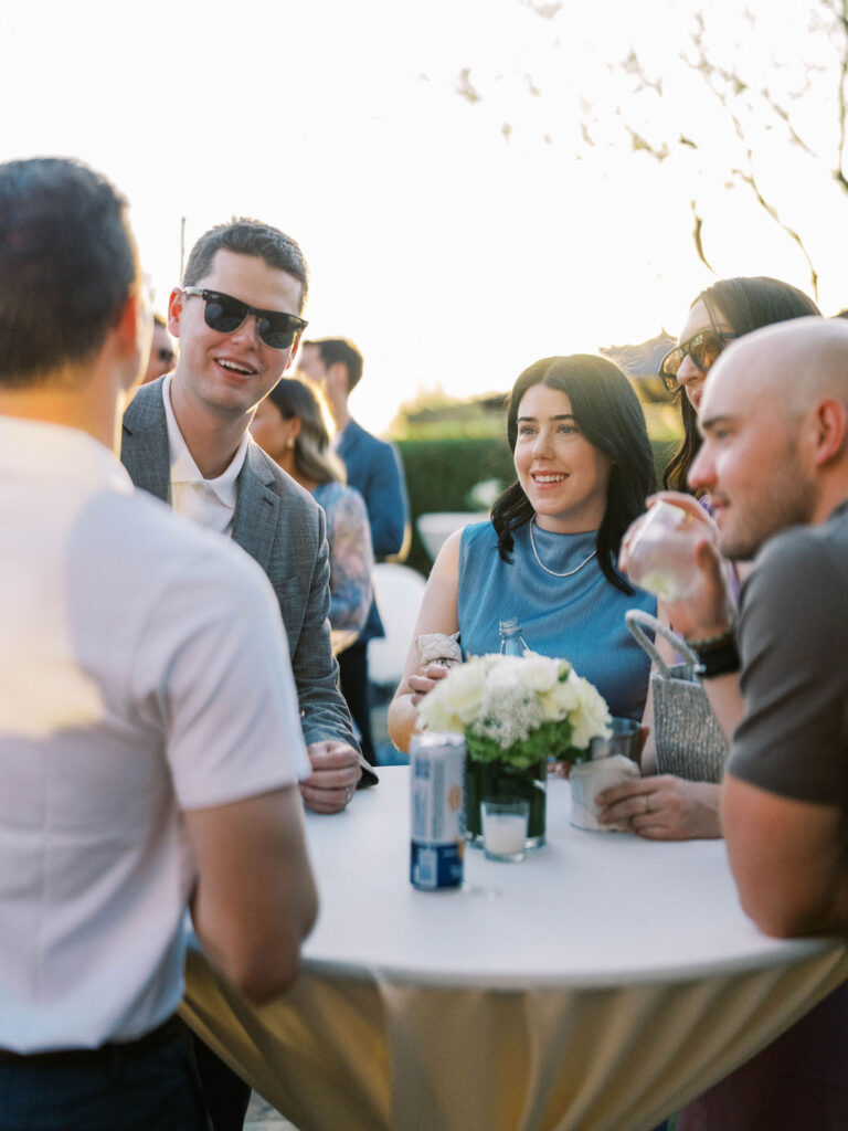 Group enjoying cocktails at Silverleaf Masters Golf wedding welcome party