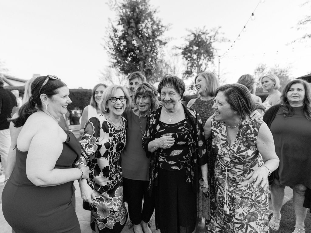 Friends smiling together at Silverleaf Masters Golf wedding weekend