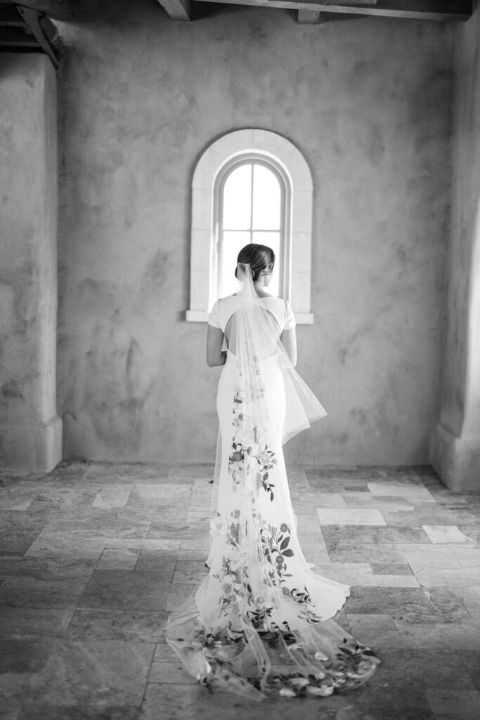 Black and white bridal portrait in arched room at DC Ranch
