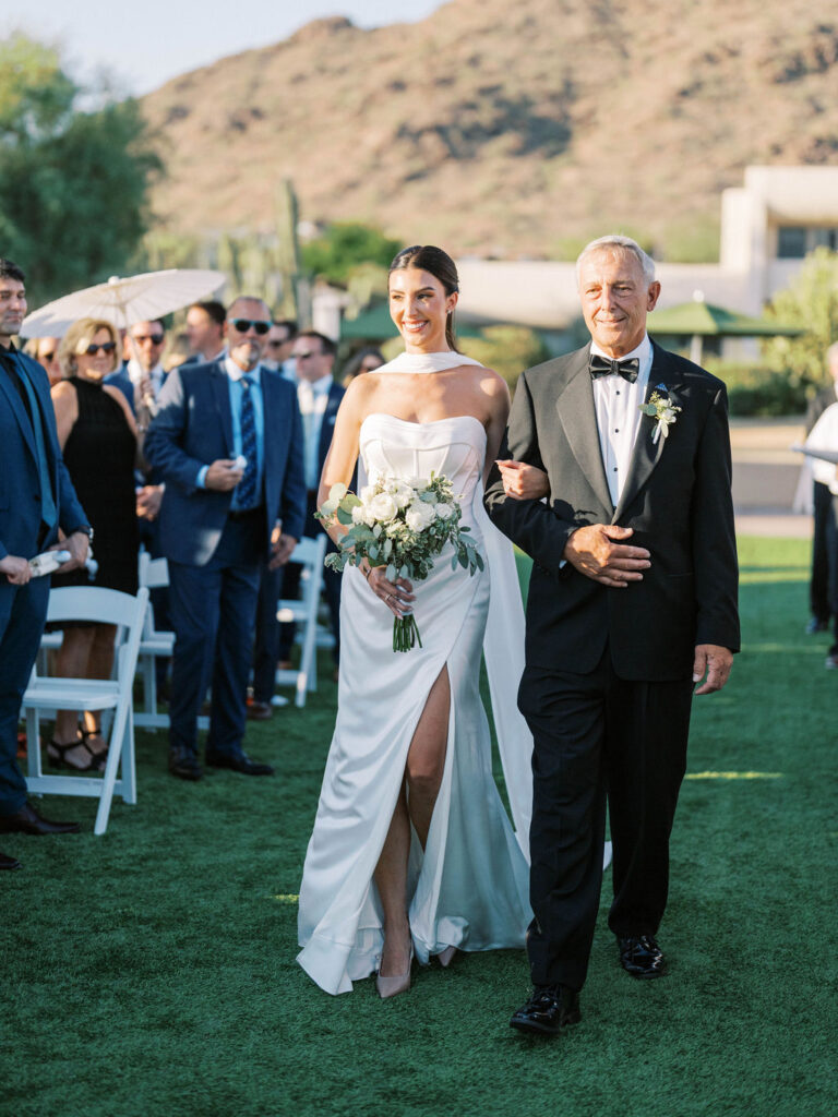 Bride walking down aisle with father Camelback Inn wedding