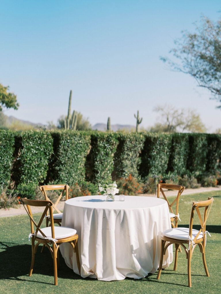 Outdoor cocktail hour table setup at DC Ranch wedding