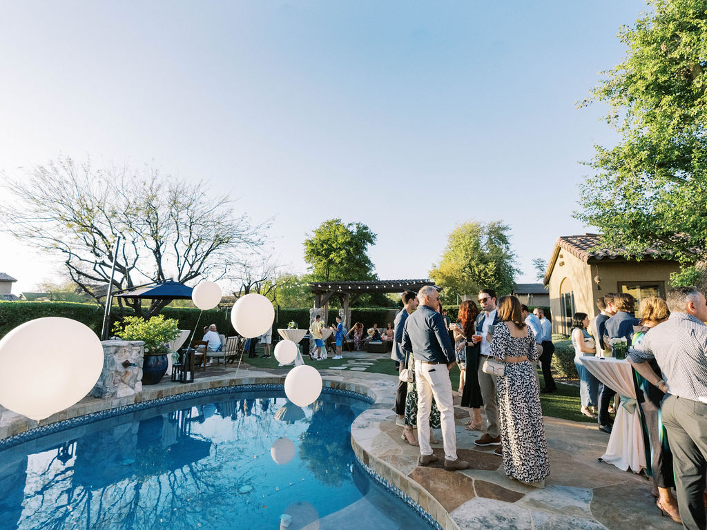 Guests poolside at Silverleaf Masters Golf wedding welcome party in Arizona