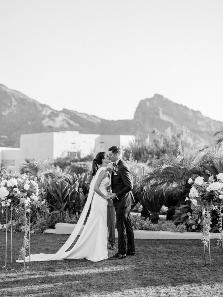 Bride and groom at altar with Camelback Mountain view