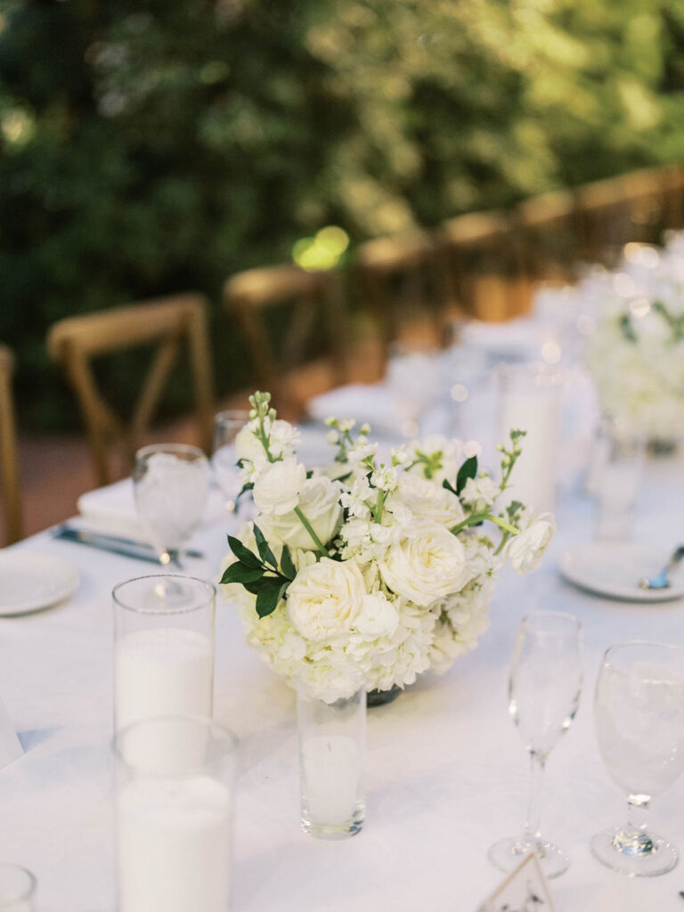 White floral centerpiece at El Chorro dinner celebration