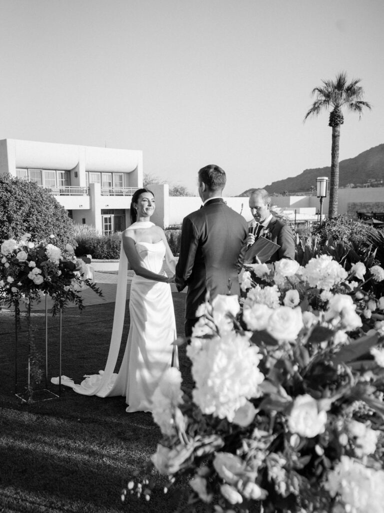 Bride and groom exchanging vows at Camelback Inn wedding ceremony