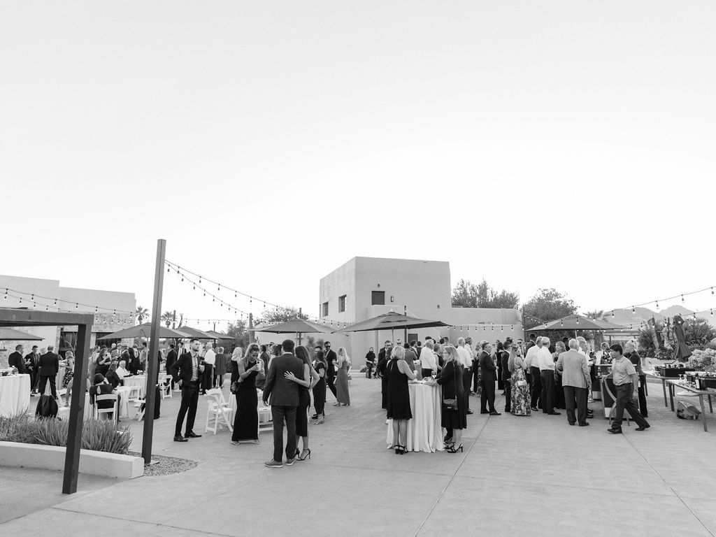 Camelback Inn wedding ceremony with floral arch and desert backdrop