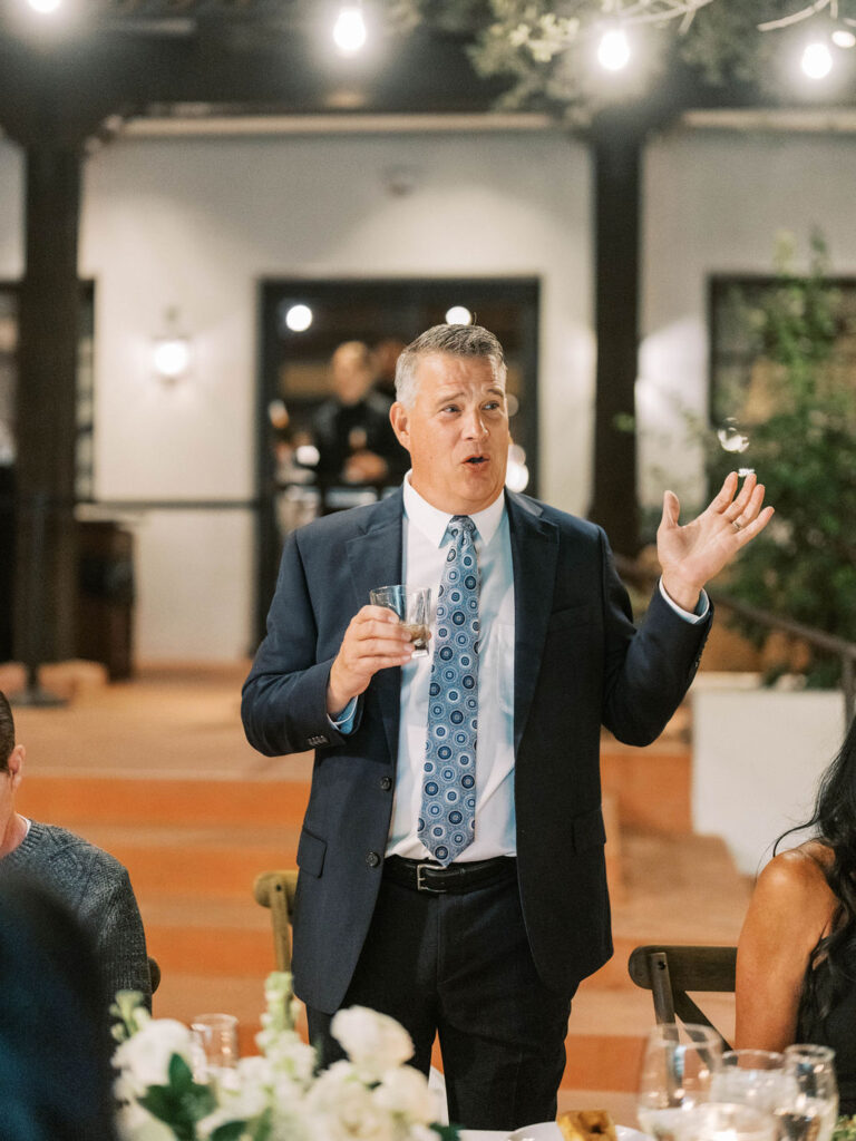 Guest giving speech during El Chorro dinner celebration
