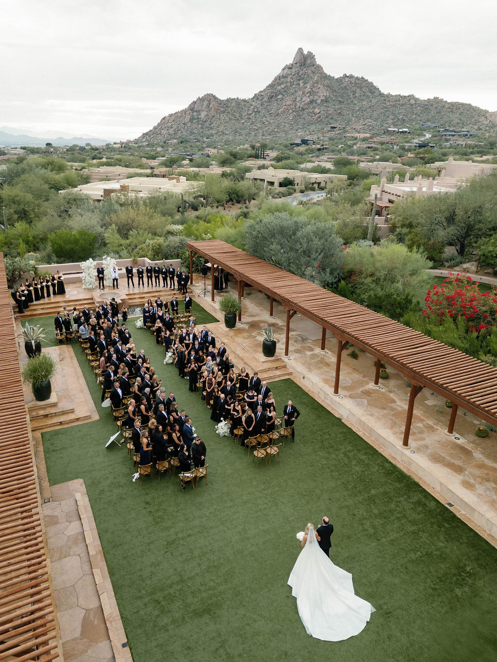 Aerial view of outdoor ceremony with Pinnacle Peak at Four Seasons Scottsdale