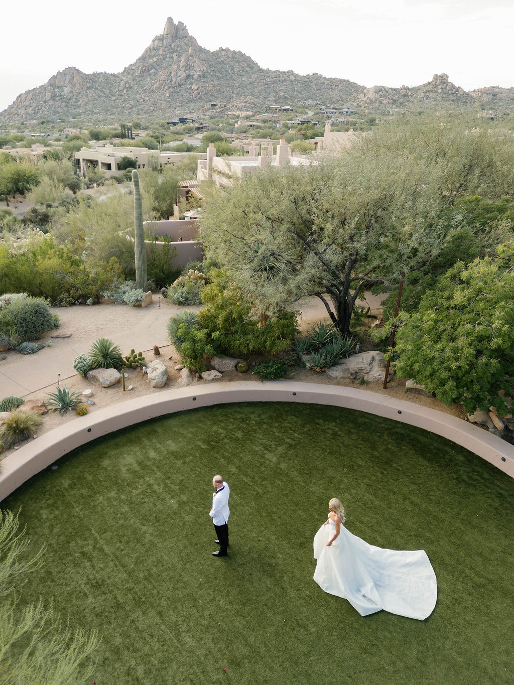Aerial view of first look with Pinnacle Peak at Four Seasons Scottsdale wedding