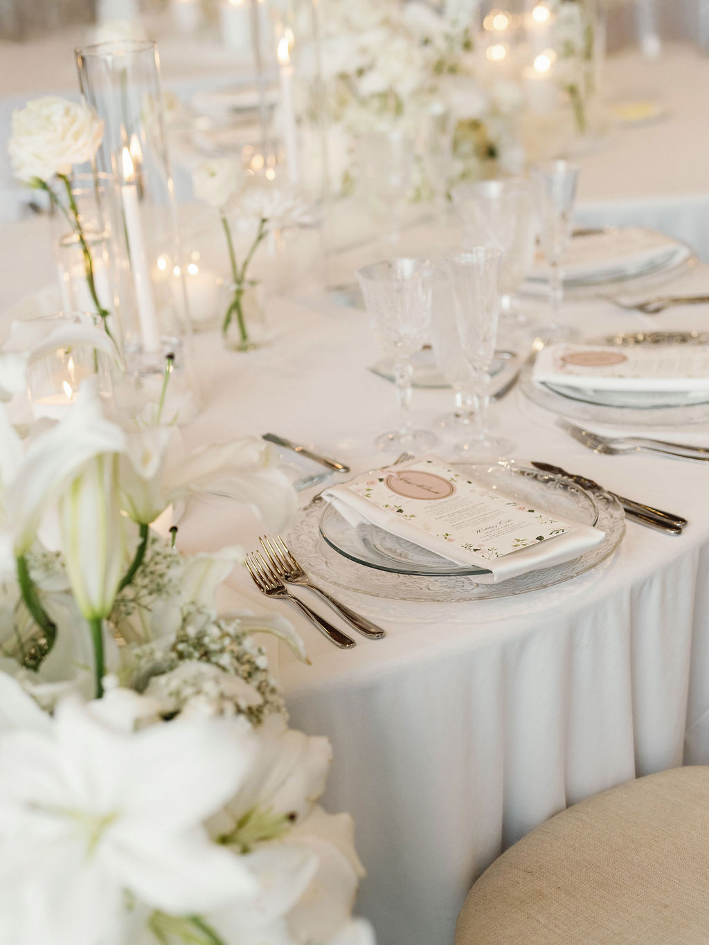 Sweetheart table with white lily cascades at Four Seasons Scottsdale reception