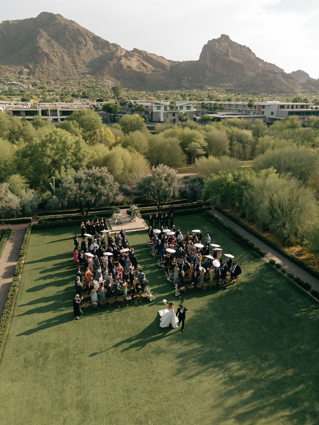 Reception dinner with mountain views and string lights at El Chorro Paradise Valley