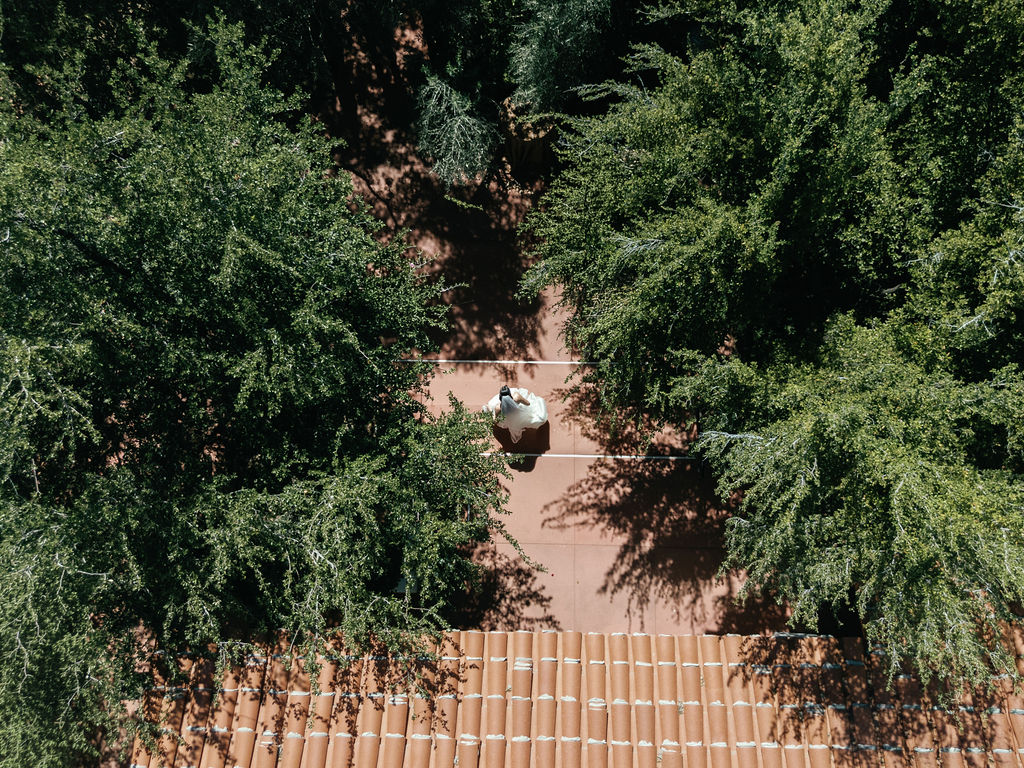 Aerial view of the bride in the courtyard at El Chorro