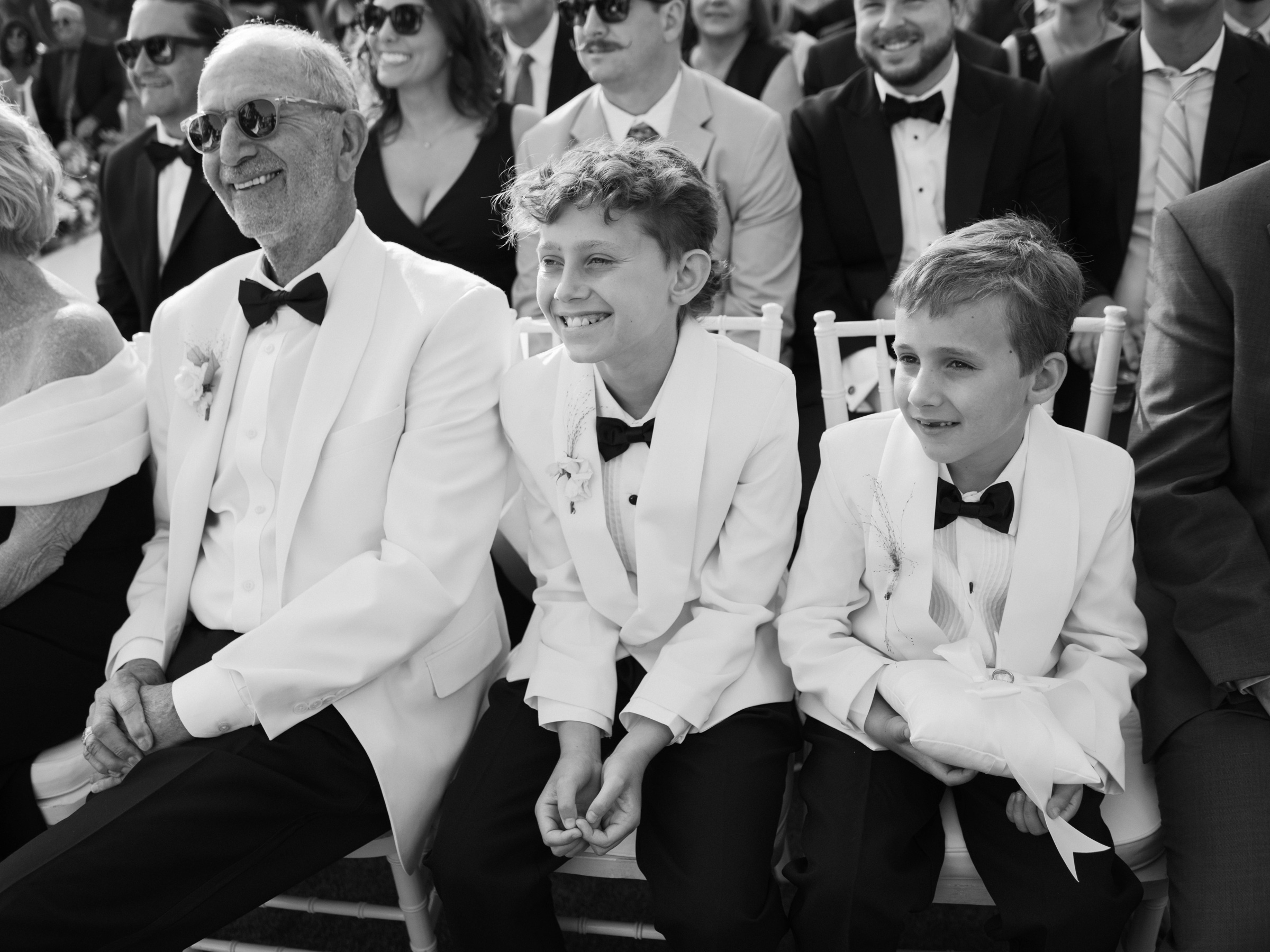 Family members smile during Meg and Peter’s Royal Palms ceremony