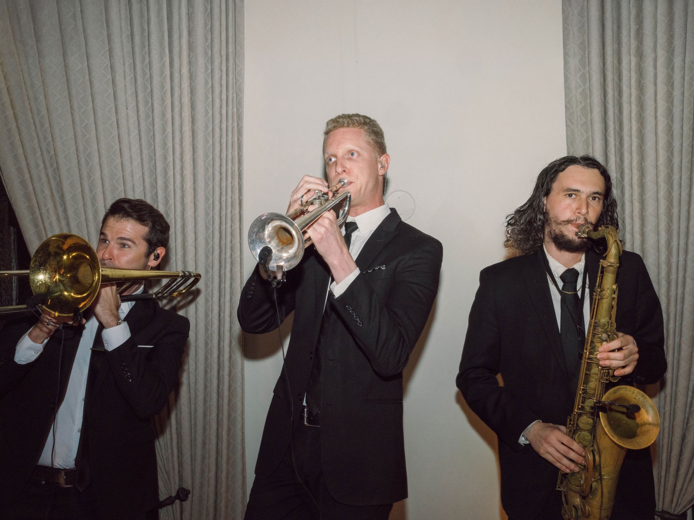 The brass musicians perform at Meg and Peter’s reception