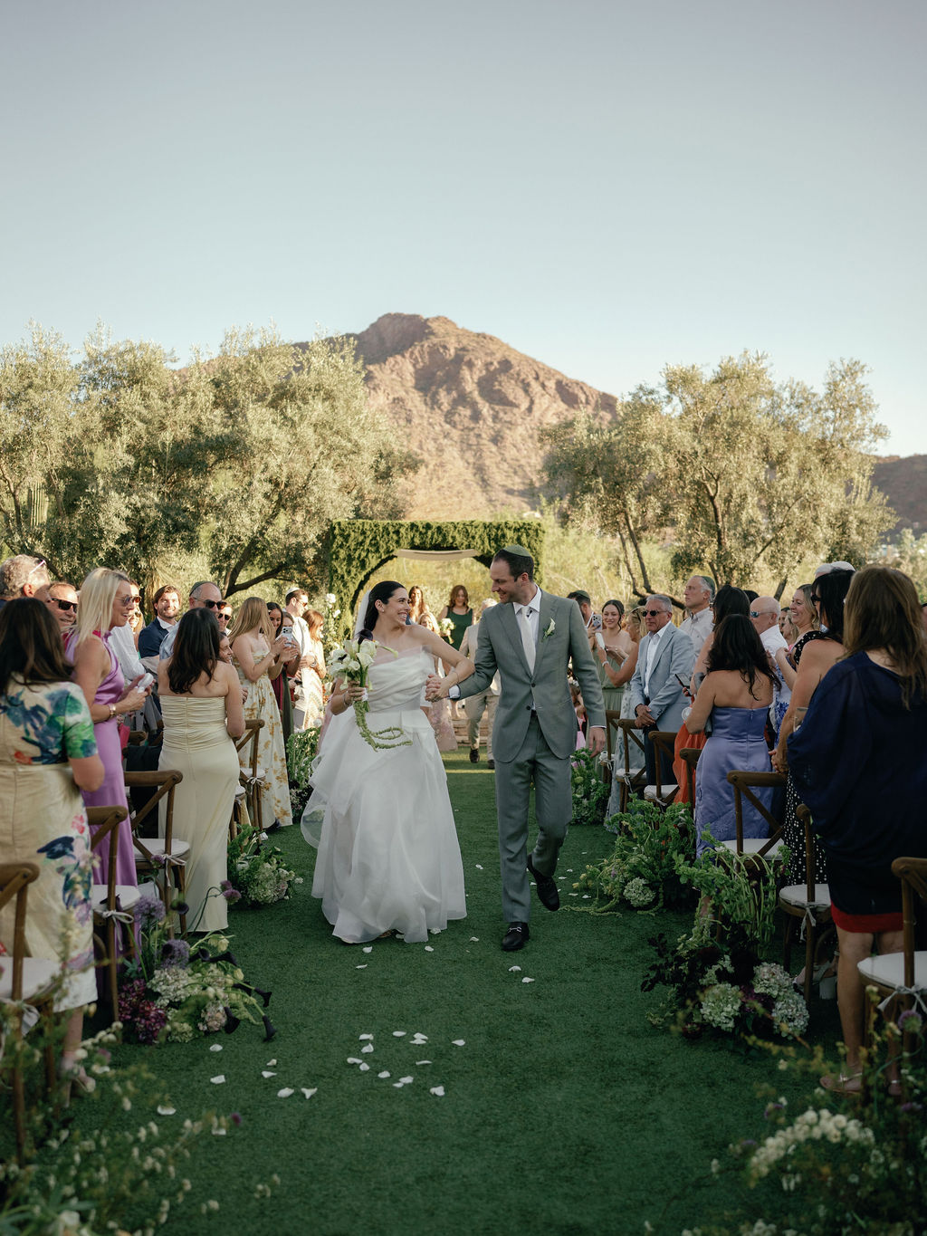 Newlyweds' recessional down the aisle after the ceremony