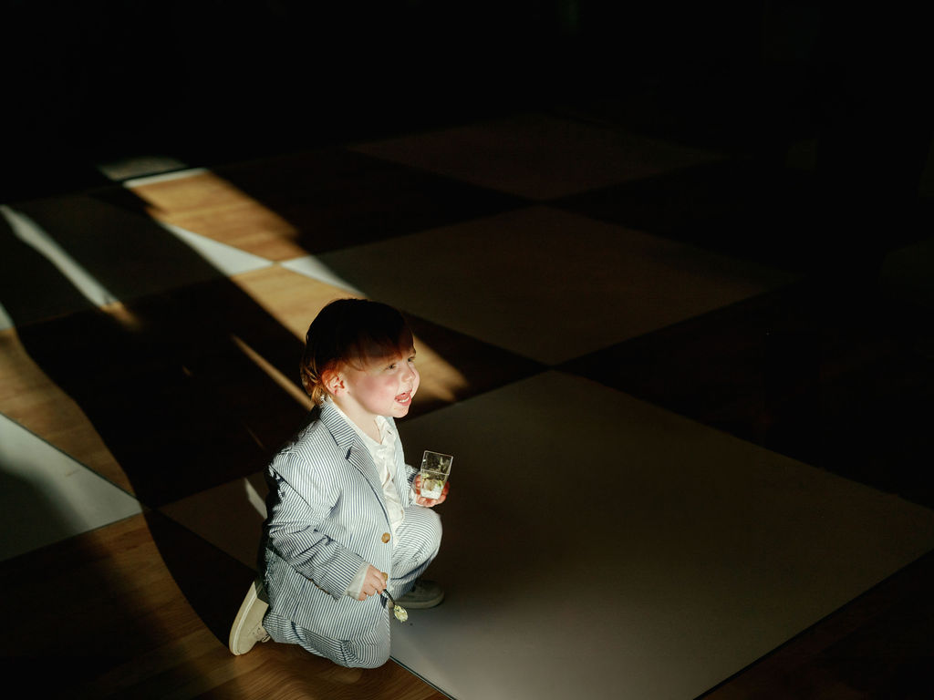 Ring bearer dancing on the reception dance floor